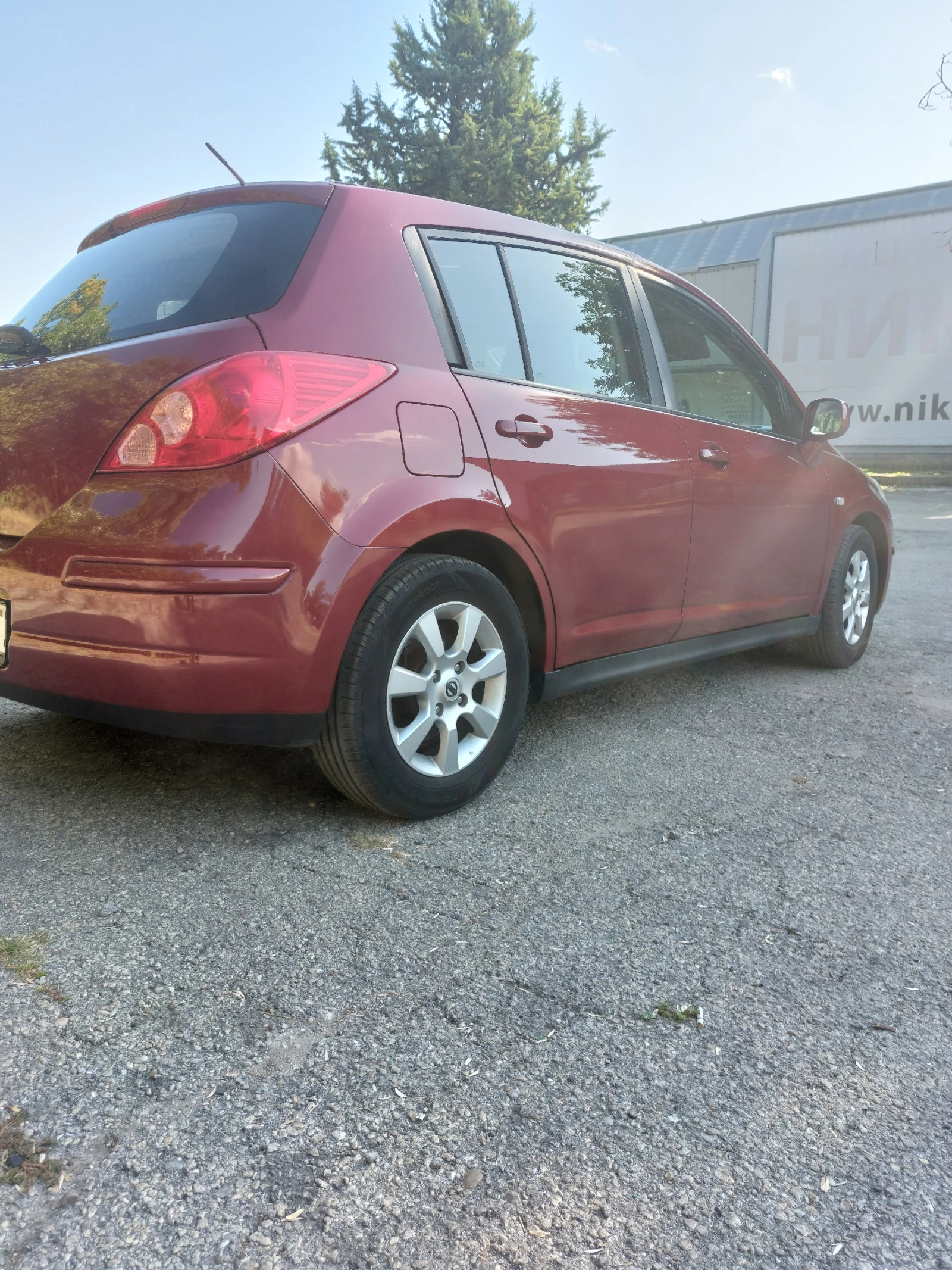Nissan Tiida  - изображение 4