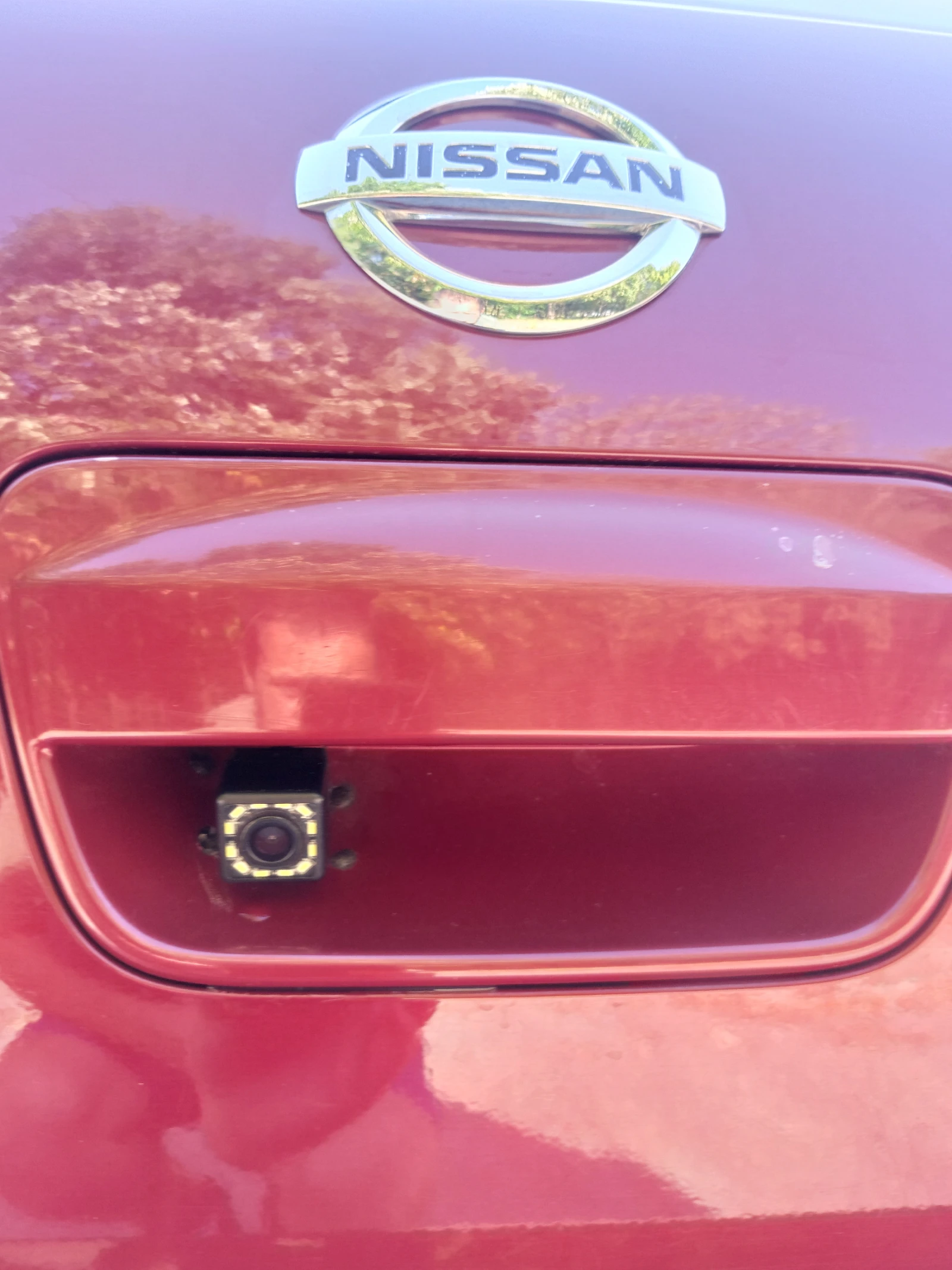 Nissan Tiida  - изображение 7