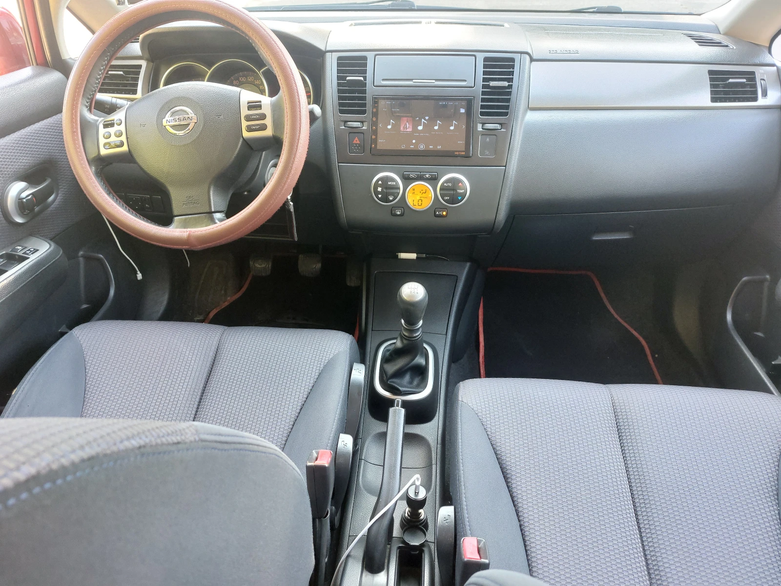Nissan Tiida  - изображение 6