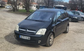     Opel Meriva 1.6  .