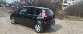     Opel Meriva 1.6  .