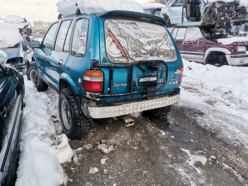 Kia Sportage 2.0i, снимка 3 - Автомобили и джипове - 48771597