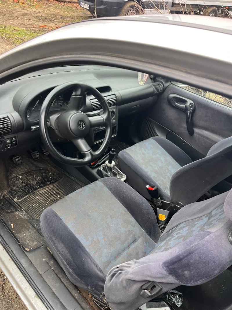 Opel Corsa 1.2i Климатик, снимка 8 - Автомобили и джипове - 53360145