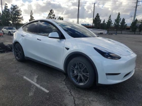 Tesla Model Y Long Range AWD - 18500 € / 36182.85 лв. - 58180701 4