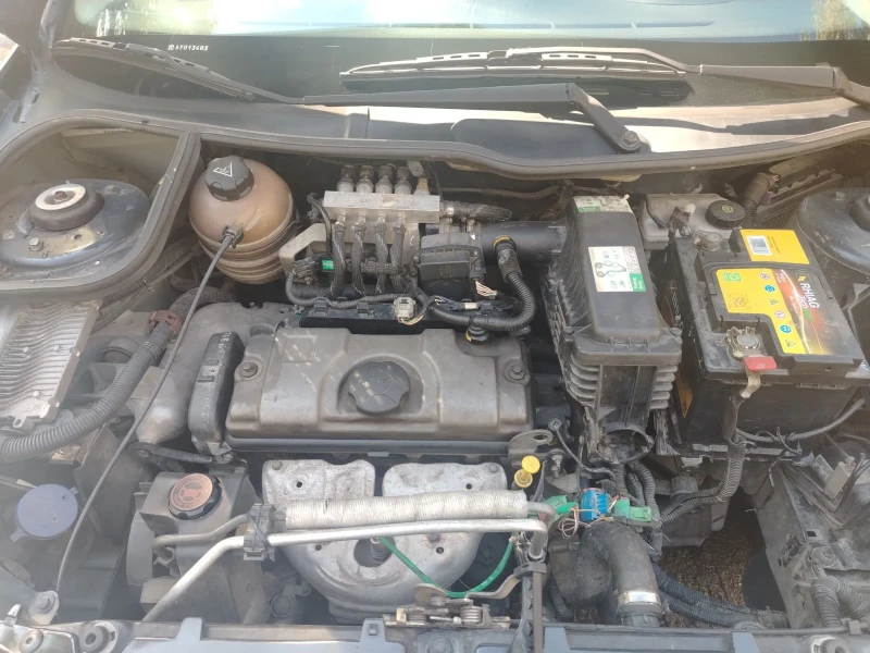 Peugeot 206 1.4i газ, снимка 13 - Автомобили и джипове - 52047280