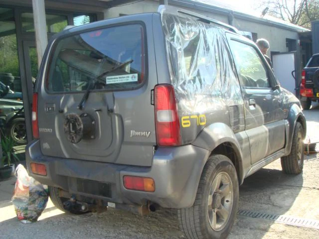 Suzuki Jimny 1.3 4wD, снимка 4 - Автомобили и джипове - 46834457