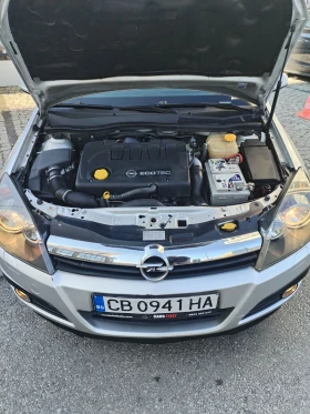 Opel Astra 1.9 120кс космо, снимка 15