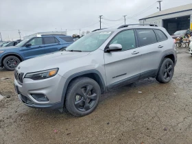 ������ Jeep Cherokee