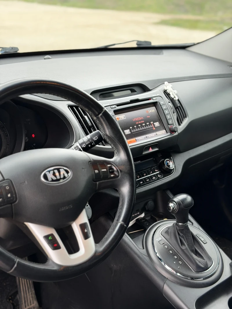 Kia Sportage, снимка 11 - Автомобили и джипове - 52659356