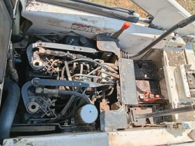 Мини челни товарачи Bobcat 453, снимка 10