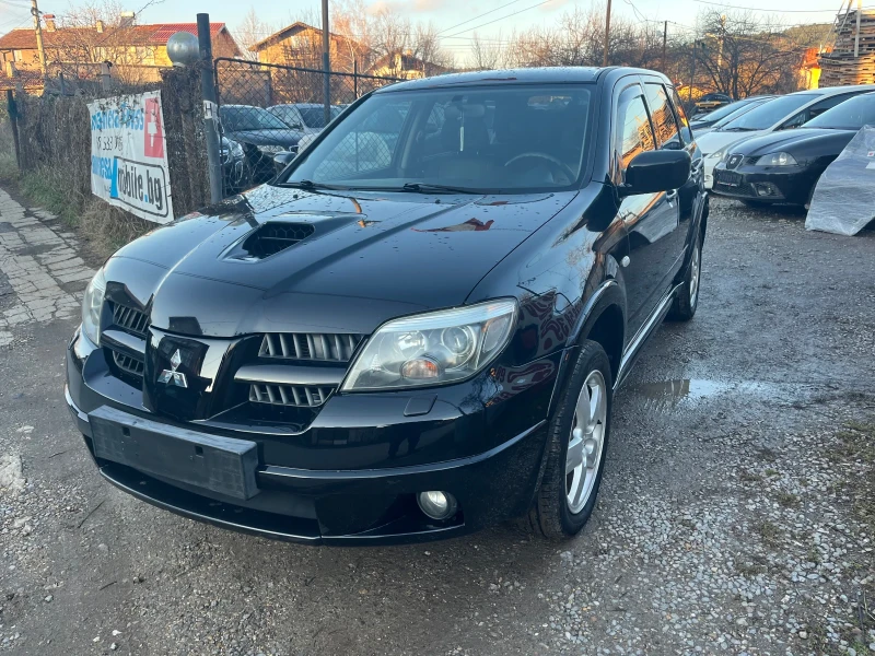 Mitsubishi Outlander 2.0T  - 4х4 - Кожа - SWISS , снимка 1 - Автомобили и джипове - 48440319