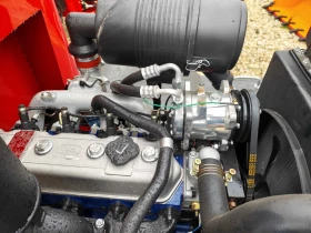 Телескопичен товарач Komatsu НОВИ 1600кг със вилици, снимка 3