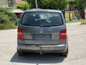 VW Touran 2.0 TDI 140 K.C | Mobile.bg    2
