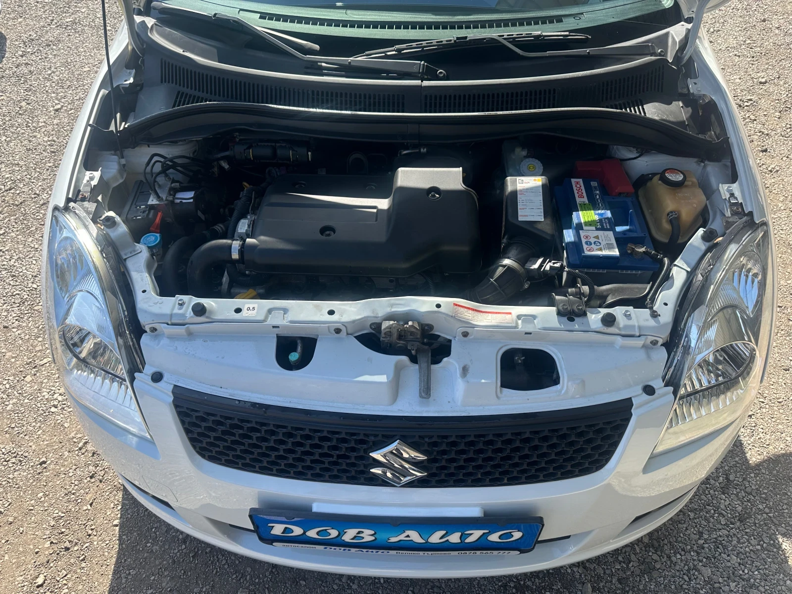 Suzuki Swift 1.3DDIS-75к.с-БЯЛА ПЕРЛА, снимка 17 - Автомобили и джипове - 53835438