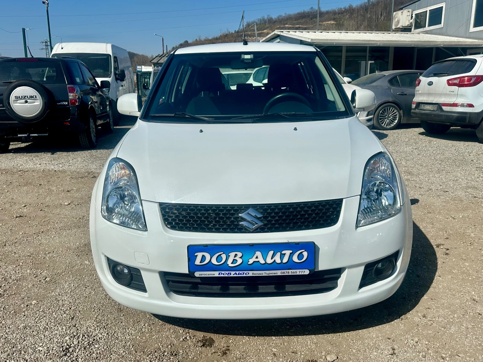 Suzuki Swift 1.3DDIS-75к.с-БЯЛА ПЕРЛА, снимка 8 - Автомобили и джипове - 53835438
