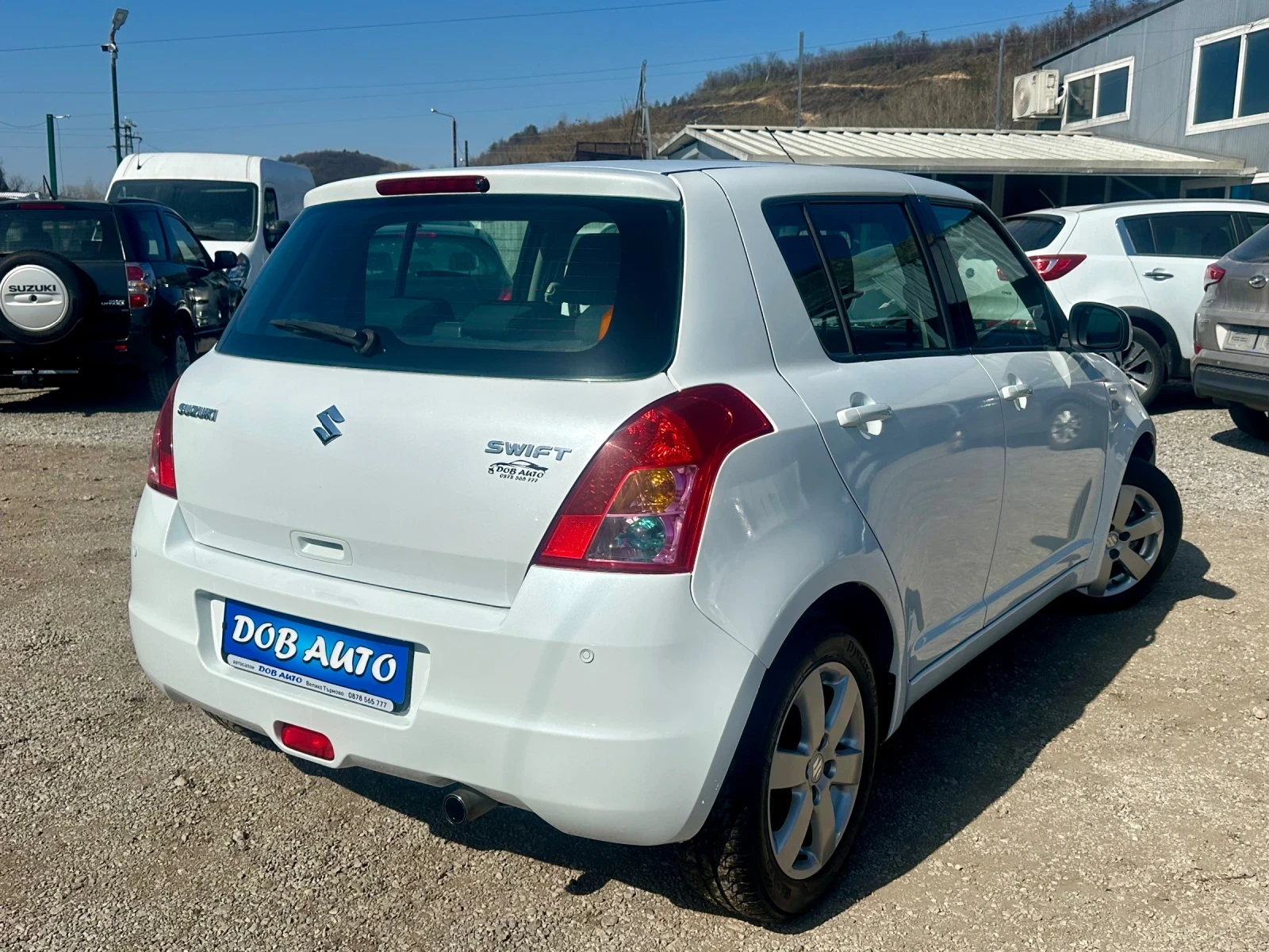 Suzuki Swift 1.3DDIS-75к.с-БЯЛА ПЕРЛА, снимка 5 - Автомобили и джипове - 53835438