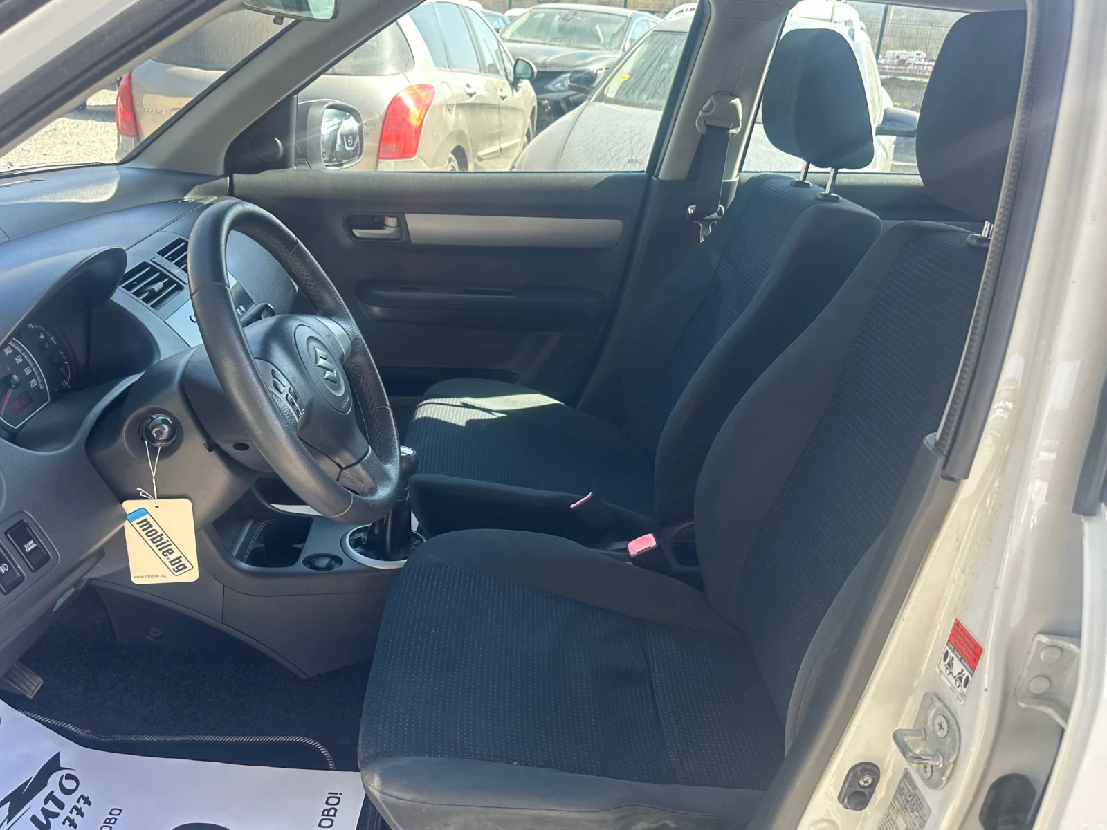 Suzuki Swift 1.3DDIS-75к.с-БЯЛА ПЕРЛА, снимка 11 - Автомобили и джипове - 53835438