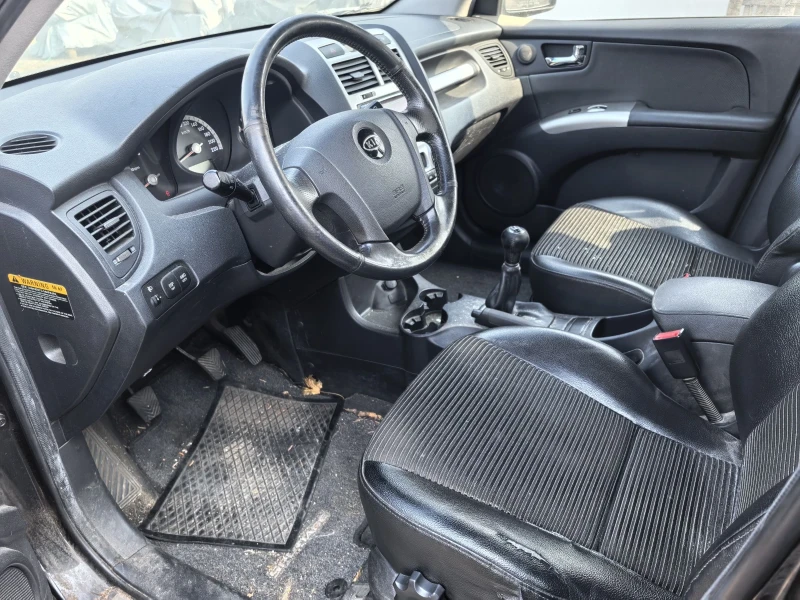 Kia Sportage 2.0i 4WD 4x4, снимка 14 - Автомобили и джипове - 49304586