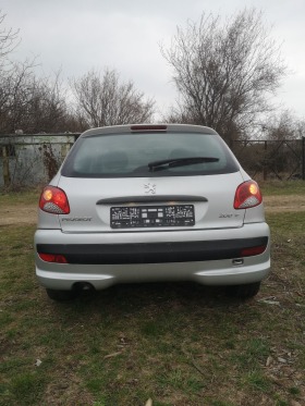 Peugeot 206 1, 1i Отлична , снимка 7 - Автомобили и джипове - 45425371