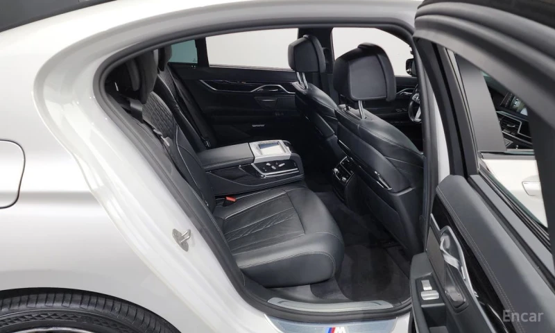 BMW 740, снимка 12 - Автомобили и джипове - 52892442