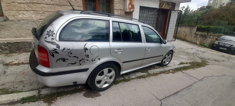 Skoda Octavia Газ-бензин, снимка 10 - Автомобили и джипове - 52461808