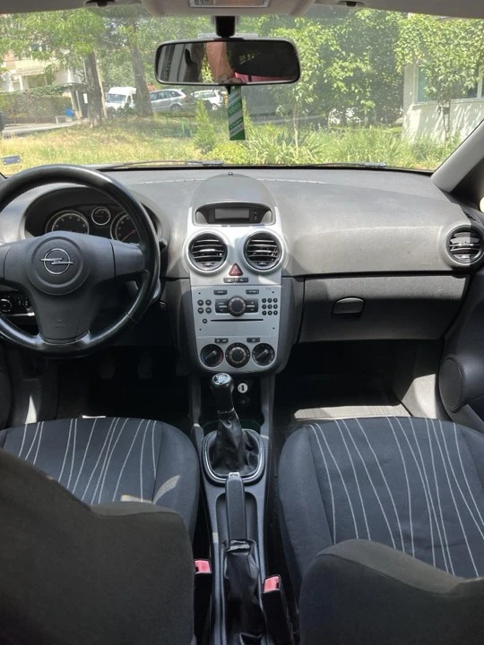 Opel Corsa 1.4 100кс, снимка 9 - Автомобили и джипове - 47492702