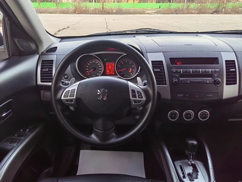 Peugeot 4007 2.4i / 4x4 / AUTOMATIC / 7 МЕСТА, снимка 15 - Автомобили и джипове - 48371940