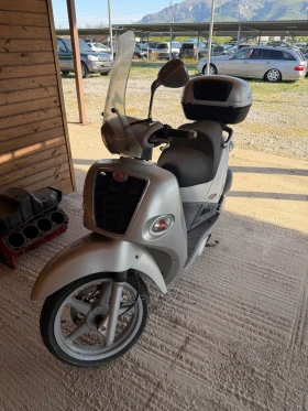 Kymco People, снимка 1