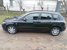 Mazda 3 1.4i Feislif , снимка 5