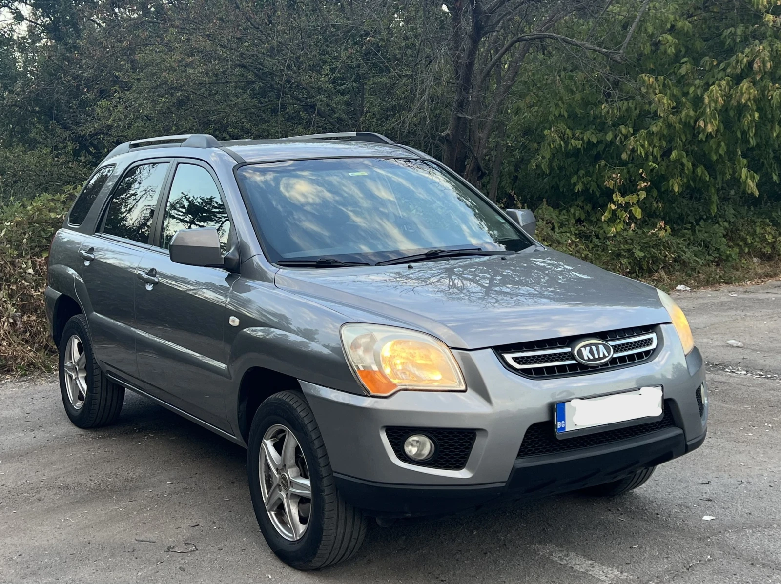Kia Sportage Газ-бензин