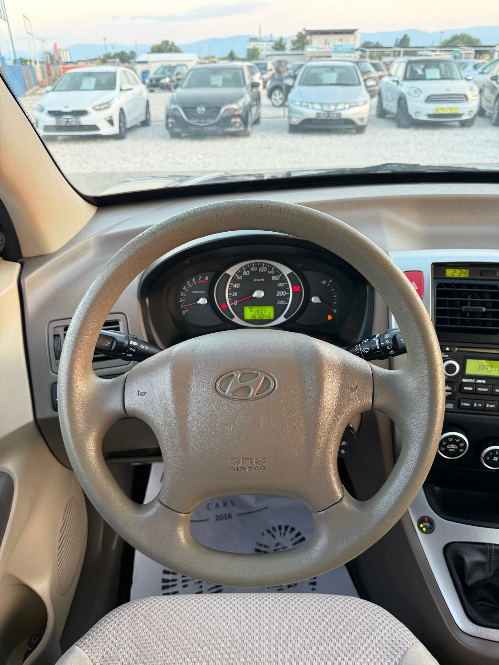Hyundai Tucson 2.0 GPL, снимка 11 - Автомобили и джипове - 55853061