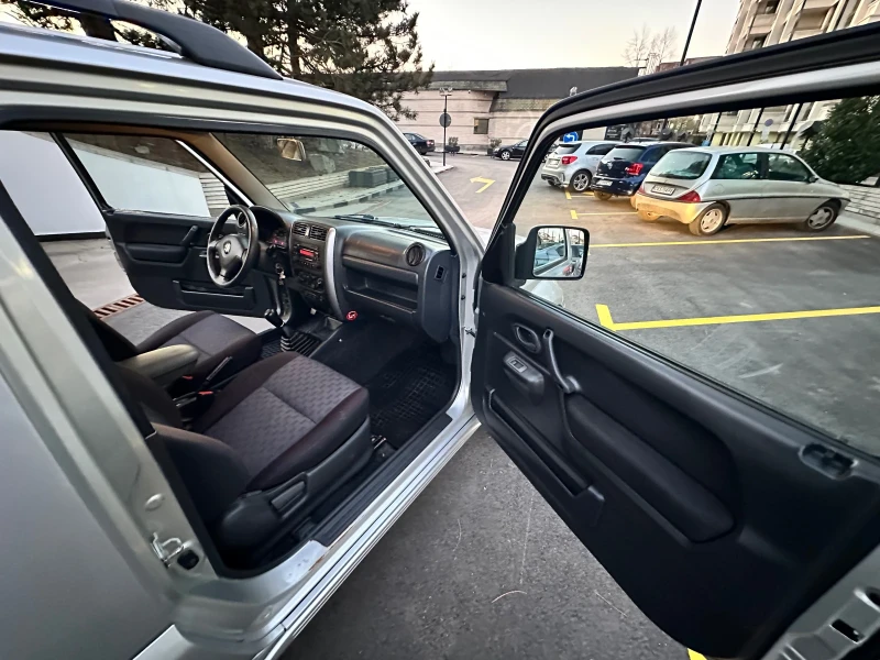 Suzuki Jimny 1.3 DOHC 4x4, снимка 12 - Автомобили и джипове - 50257570