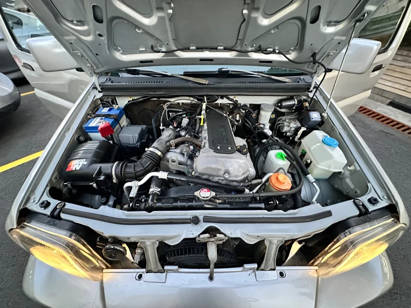 Suzuki Jimny 1.3 DOHC 4x4, снимка 13 - Автомобили и джипове - 50257570