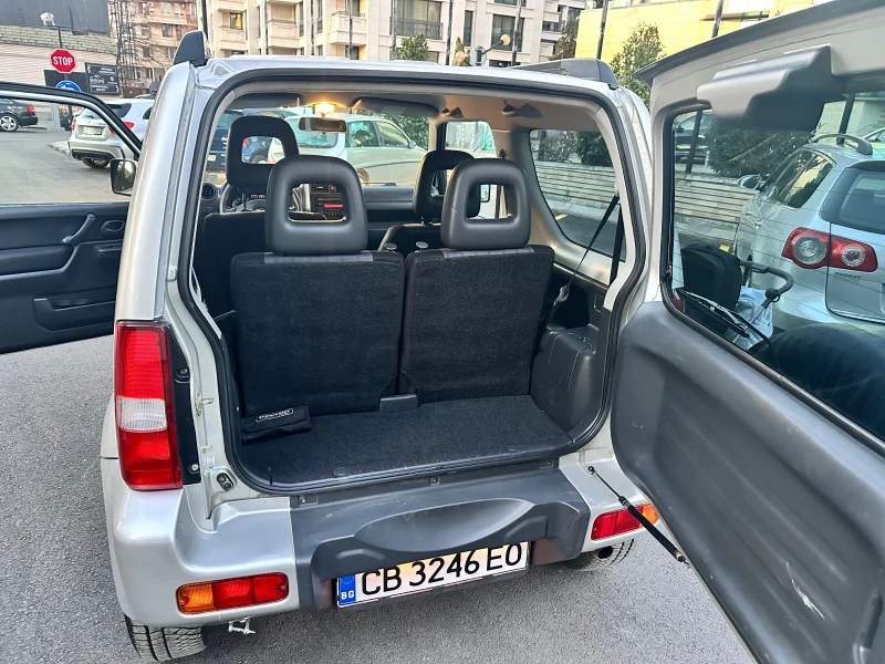 Suzuki Jimny 1.3 DOHC 4x4, снимка 10 - Автомобили и джипове - 50257570