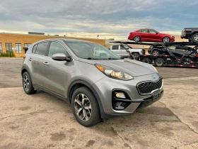������ Kia Sportage