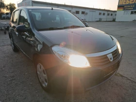Обява за продажба на Dacia Sandero 1, 4 i, ПЕРФЕКТНА, ЛИЗИНГ  ~3 699 лв. - изображение 1
