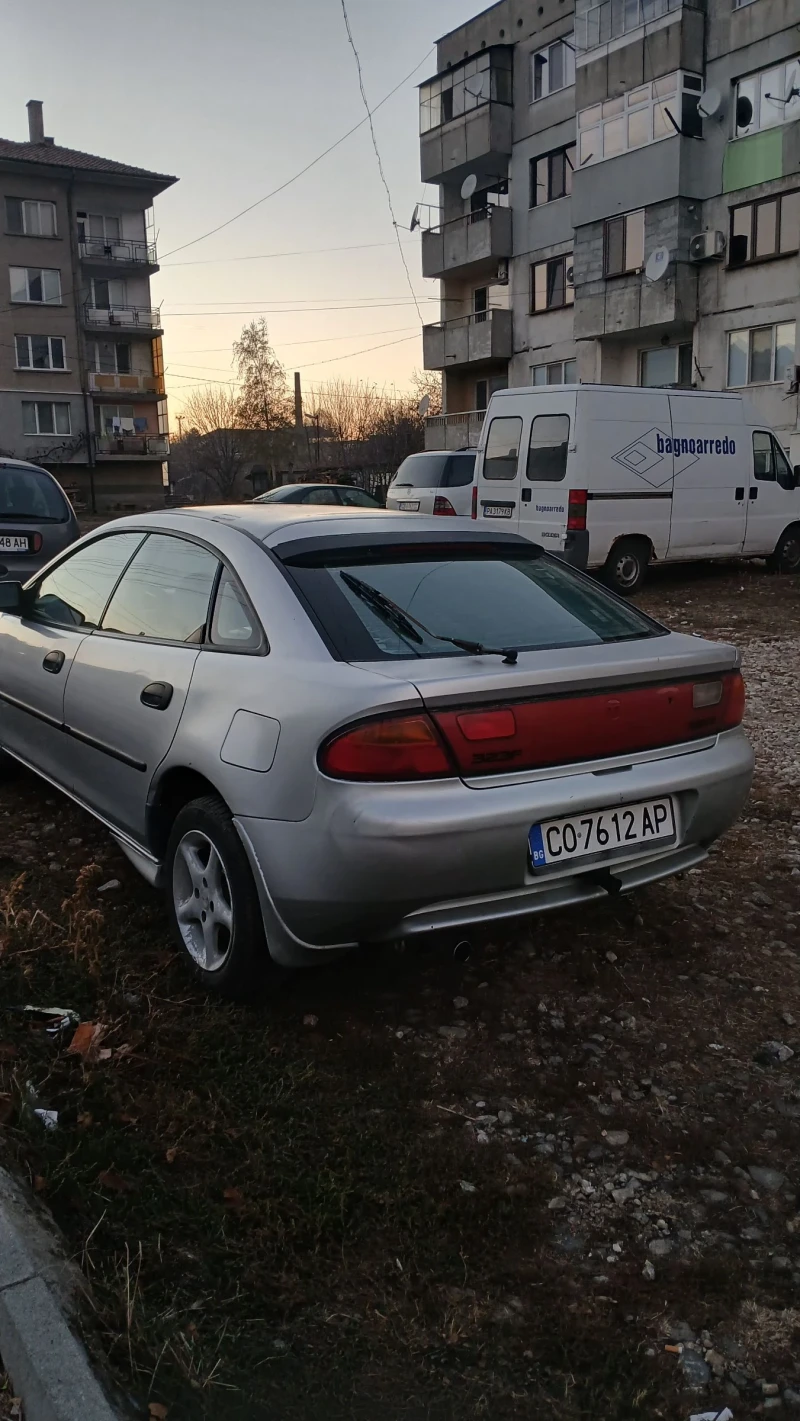 Mazda 323, снимка 4 - Автомобили и джипове - 48003581