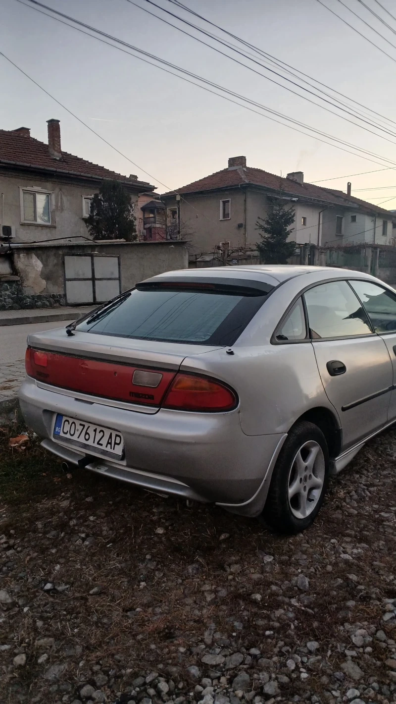 Mazda 323, снимка 5 - Автомобили и джипове - 48003581