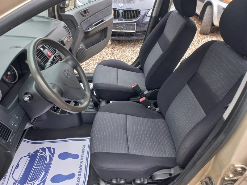 Hyundai Getz 1.4* benz* klima* 4 vrati, снимка 10 - Автомобили и джипове - 48312686