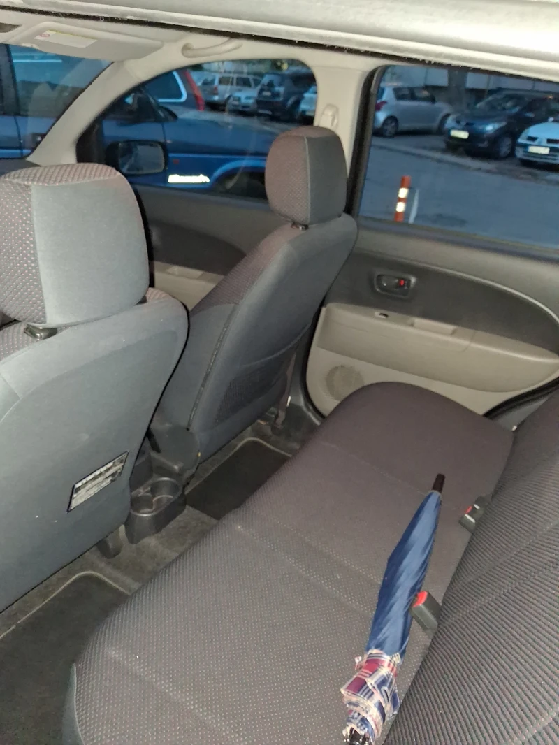 Daihatsu Sirion 1.3i 16V, снимка 6 - Автомобили и джипове - 53053004