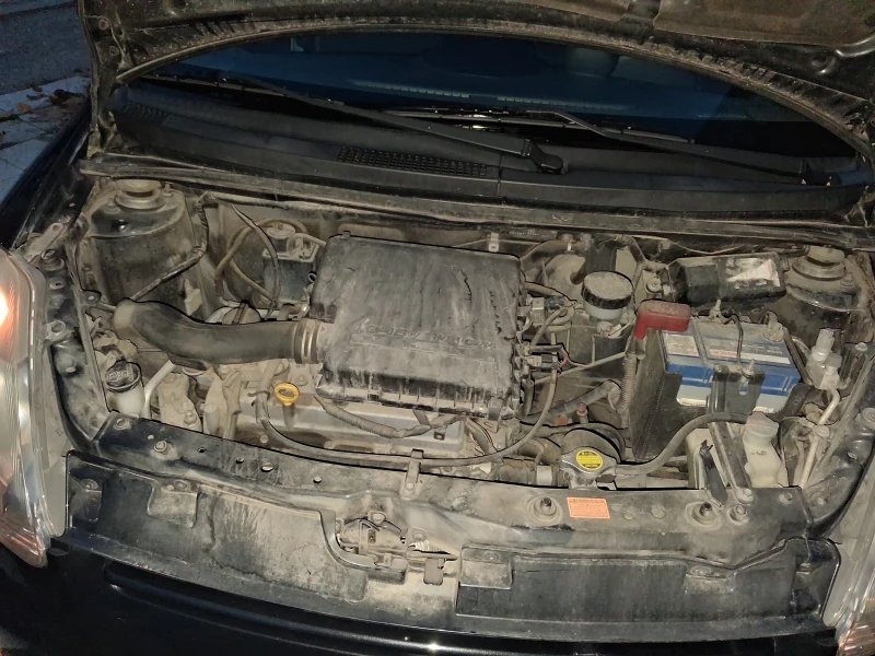 Daihatsu Sirion 1.3i 16V, снимка 9 - Автомобили и джипове - 53053004