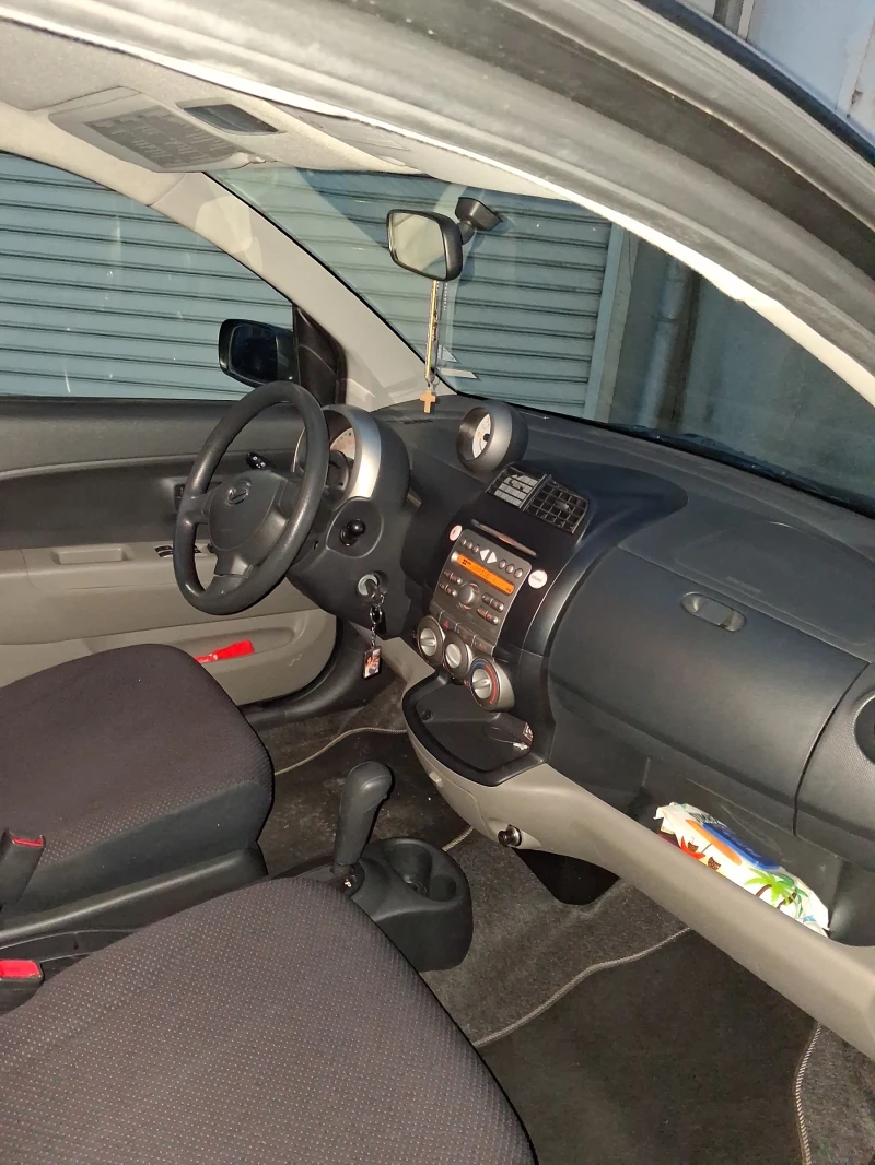 Daihatsu Sirion 1.3i 16V, снимка 7 - Автомобили и джипове - 53053004