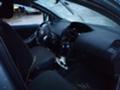 Toyota Yaris 1.3i, снимка 14 - Автомобили и джипове - 23470529