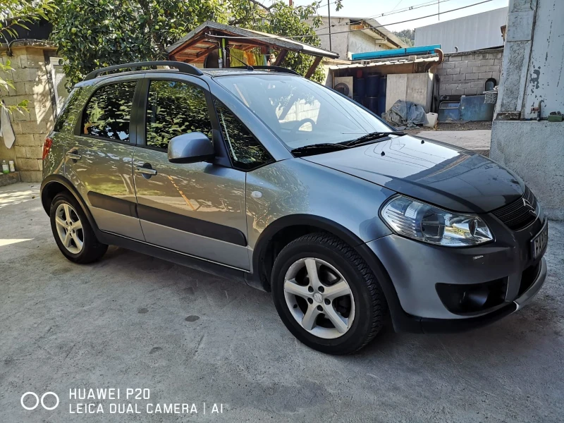 Suzuki SX4, снимка 9 - Автомобили и джипове - 46892940