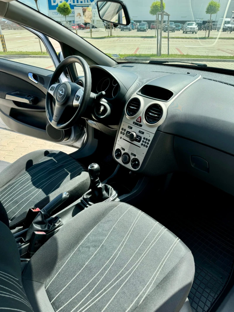 Opel Corsa D 1.2, снимка 9 - Автомобили и джипове - 52500075