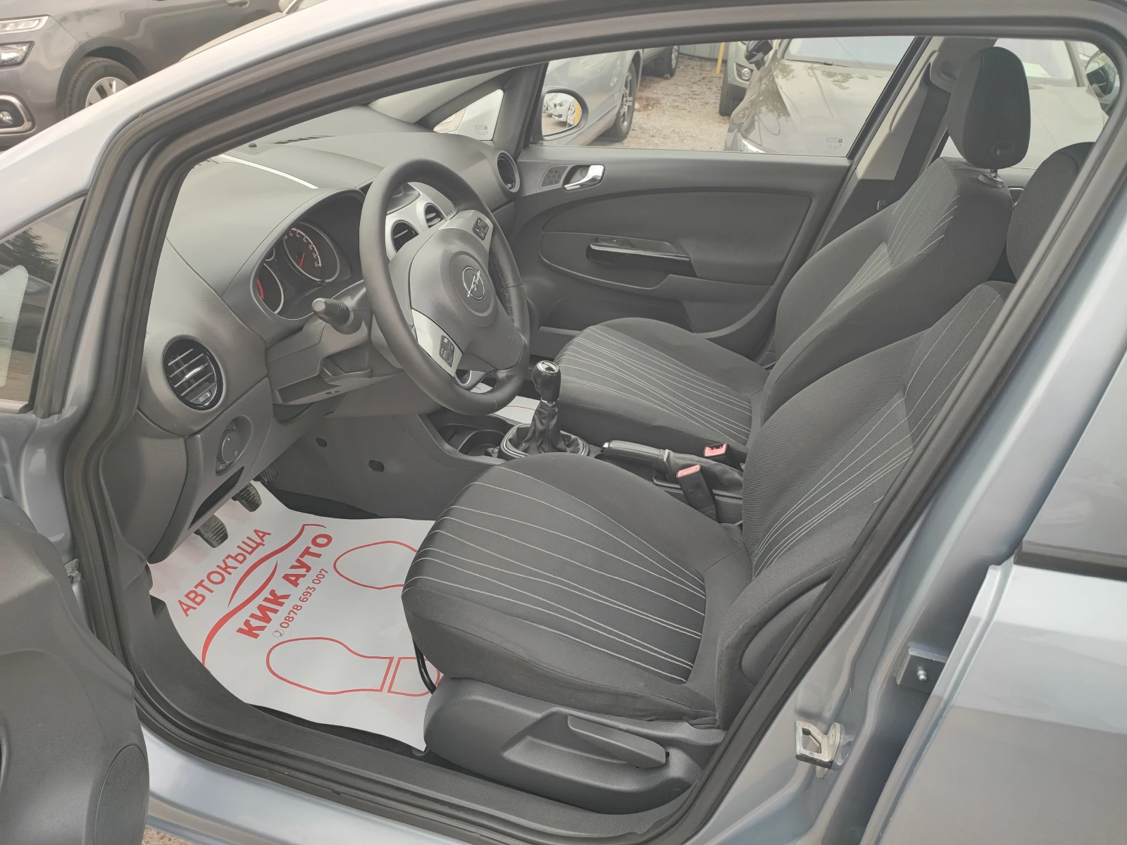 Opel Corsa 1.3CDTI - 75ks-ECO FLEX, снимка 9 - Автомобили и джипове - 54452003