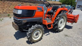����� �� �������� �� ������� Kubota T220 � �����, 4x4, 22 ��., ������ ������