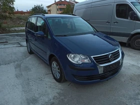 VW Touran 1.9 TDI 7 МЕСТА 6 СКОРОСТИ ПОДГРЯВАНЕ НА СЕДАЛКИТЕ, снимка 1