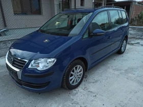 VW Touran 1.9 TDI 7 МЕСТА 6 СКОРОСТИ ПОДГРЯВАНЕ НА СЕДАЛКИТЕ, снимка 2