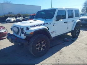 Jeep Wrangler UNLIMITED RUBICON* ПОДГРЕВ* CARPLAY*  - 22800 € / 44592.92 лв. - 66155488 2